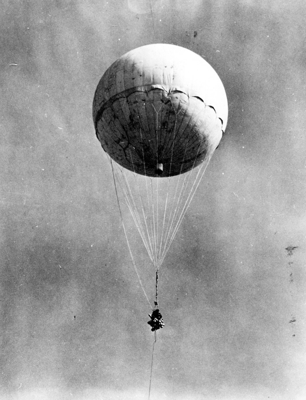 A Japanese 10-meter diameter Mulberry paper balloon re-inflated at NAS Moffett Field, CA following its downing by a Navy aircraft about 30 miles west of Alturas, CA on January 10, 1945 (US Army photo A 37180C). Public domain, via Wikimedia Commons.